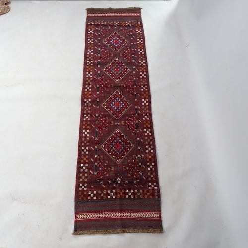 2357 - A red ground Meshwani runner, 232cm x 60cm