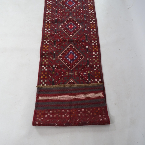 2357 - A red ground Meshwani runner, 232cm x 60cm