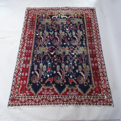 2362 - A red and blue ground Persian rug, 205cm x 148cm