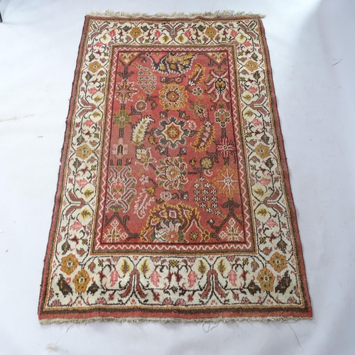 2363 - A cream ground Turkish Kilim rug, 205cm x 128cm