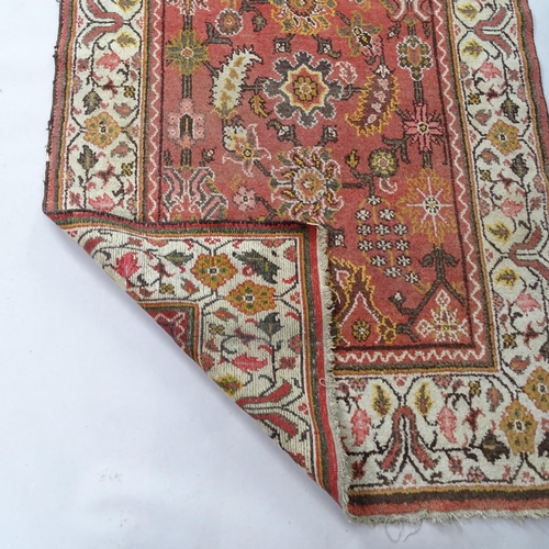 2363 - A cream ground Turkish Kilim rug, 205cm x 128cm