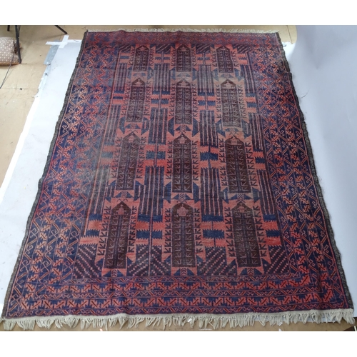 2365 - A red ground Afghan carpet, 295cm x 210cm