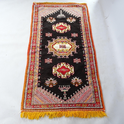 2373 - A Moroccan Berber rug, 207cm x 103cm