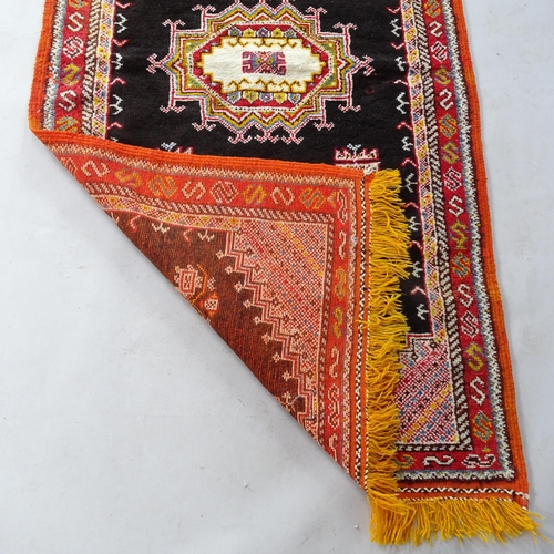 2373 - A Moroccan Berber rug, 207cm x 103cm