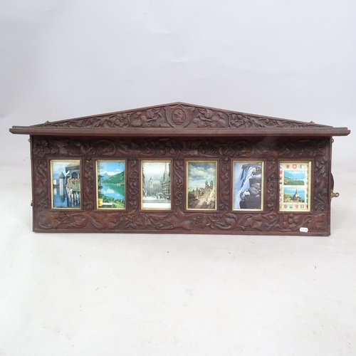 2380 - An Antique carved mahogany picture frame, 93cm x 42cm x 13cm, and a mahogany hanging shelf, with car... 