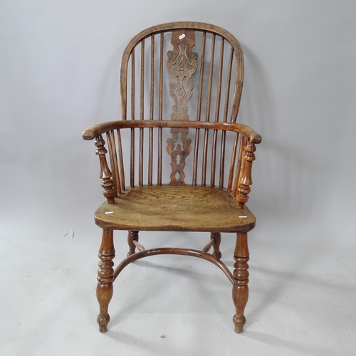 2251 - *DESCRIPTION CHANGE* An 18th century yew wood and elm-seated Windsor kitchen chair, with crinoline s... 