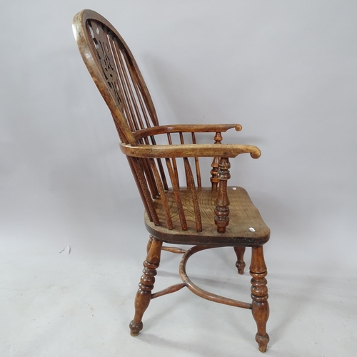 2251 - *DESCRIPTION CHANGE* An 18th century yew wood and elm-seated Windsor kitchen chair, with crinoline s... 