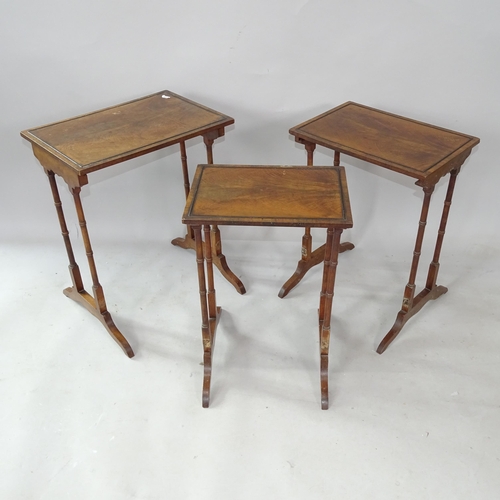 2254 - A nest of 3 walnut occasional tables, largest 47cm x 77cm x 32cm