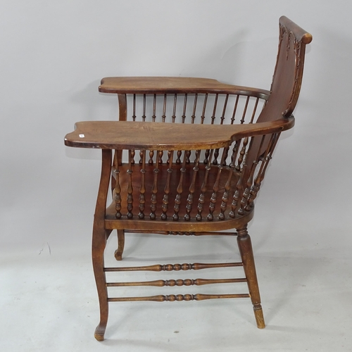 2259 - An Antique Arts and Crafts oak and elm-seated armchair in the manner of Libertys