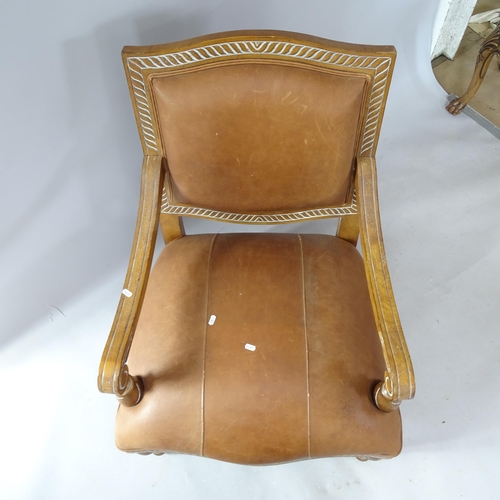 2267 - A Continental style walnut and faux leather-upholstered open armchair