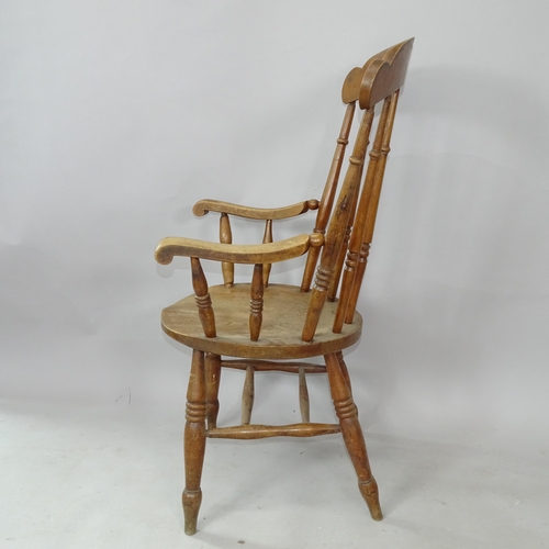 2271 - An Antique oak and elm-seated kitchen armchair