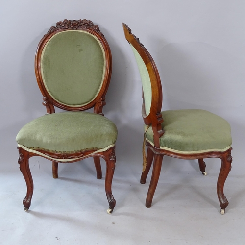 2280 - A pair of Continental style walnut parlour chairs, with carved decoration