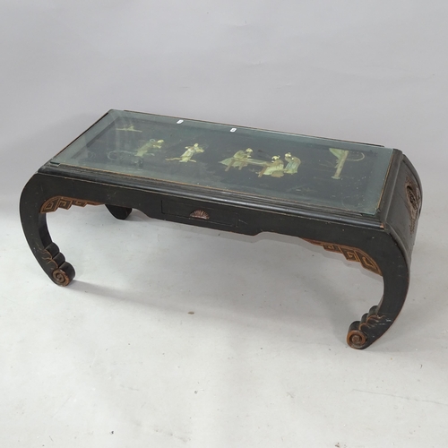 2284 - An ebonised Chinese opium table, with inlaid decoration, inset glass top and single frieze drawer, L... 