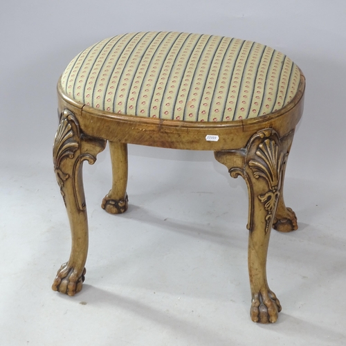 2285 - A French walnut dressing stool, on cabriole legs, with claw and ball feet, and shell carved decorati... 