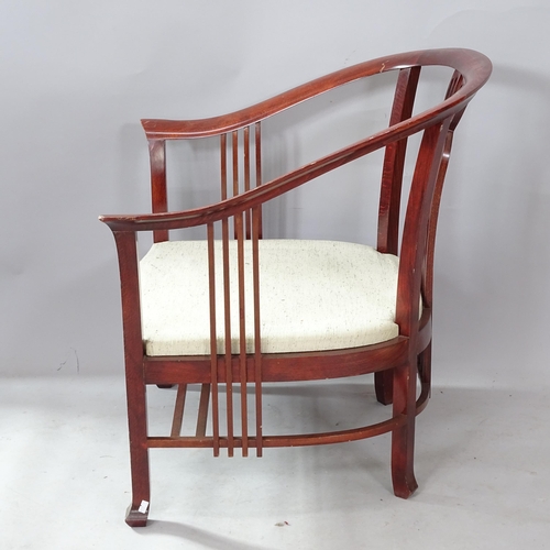 2292 - A Giorgetti tub armchair, with fretwork back and sides, with maker's marks