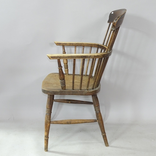 2295 - An Antique elm-seated kitchen bow arm chair