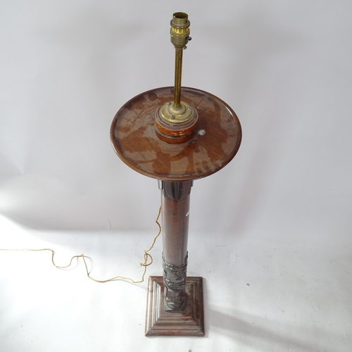 2300 - A carved mahogany torchere converted to a standard lamp, height to bayonet fitting 154cm