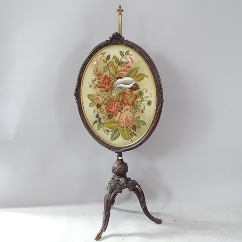 2301 - A 19th century rosewood tapestry upholstered pole screen