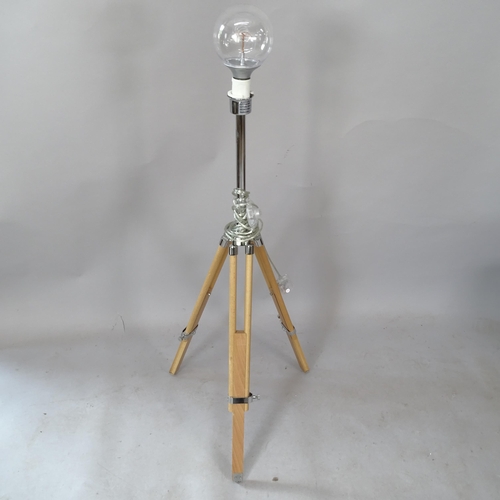 2312 - A contemporary telescopic floor lamp on tripod base