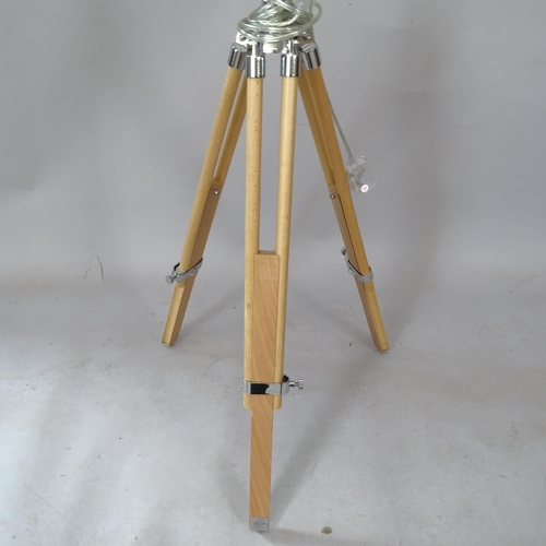 2312 - A contemporary telescopic floor lamp on tripod base