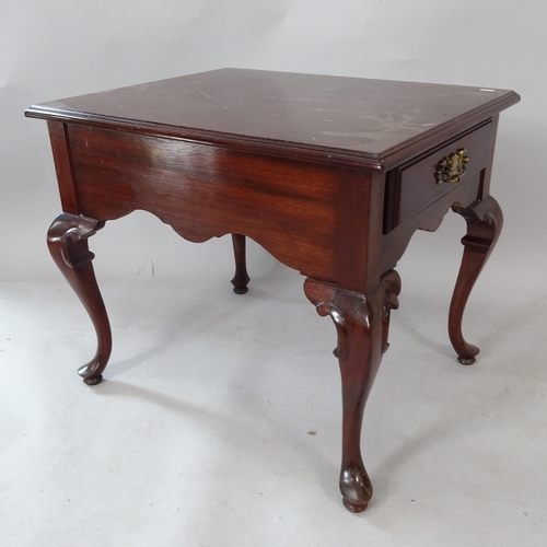 2319 - A reproduction mahogany low rectangular occasional table, on cabriole legs, with end frieze drawer, ... 