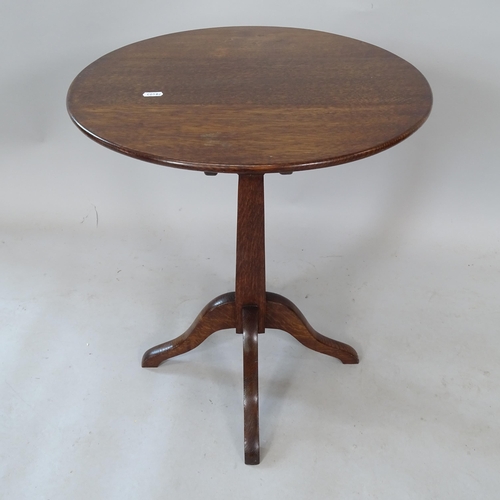 2320 - An oak circular tilt-top occasional table, 49cm x 54cm