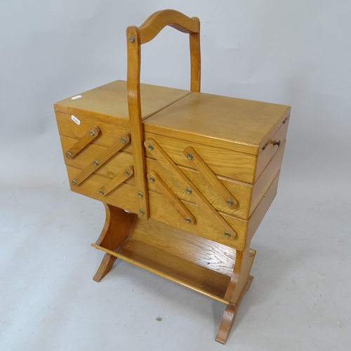 2322 - A reproduction teak cantilever sewing box