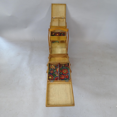 2322 - A reproduction teak cantilever sewing box