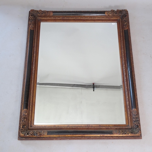 2324 - A Mexican made modern bevel-edge wall mirror, 100cm x 125cm