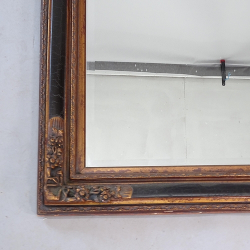 2324 - A Mexican made modern bevel-edge wall mirror, 100cm x 125cm