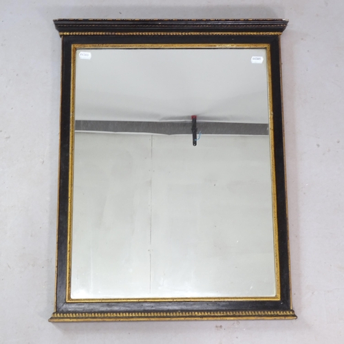 2328 - An early 20th century rectangular wall mirror, in ebonised frame, 52cm x 66cm