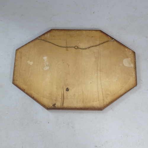 2329 - An oak 1930s oval bevel-edge wall mirror, in octagonal frame with inlaid decoration, 84cm x 58cm