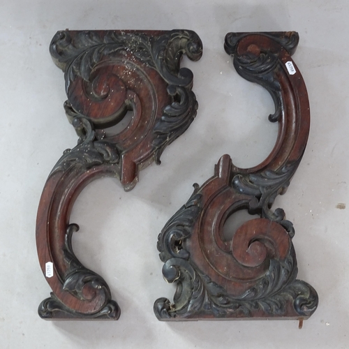 2338 - A pair of antique carved oak furniture mounts, 52cm