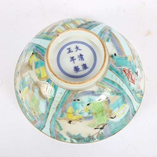 435 - A Chinese porcelain bowl with painted figure panels and 6 character mark, 16cm across