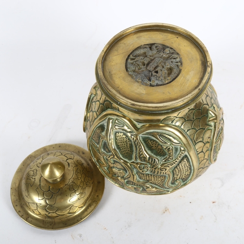 436 - A Chinese bronze jar and cover, height 23cm