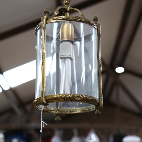 439 - A Vintage brass-framed glass cylinder hanging lantern, height 80cm