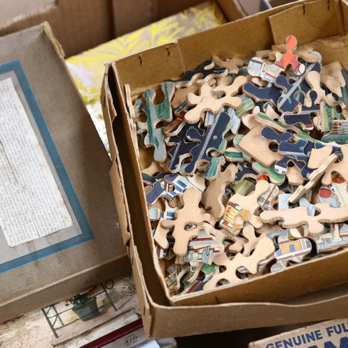 497 - A large selection of Vintage jigsaw puzzles