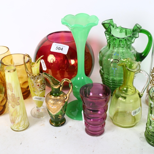 504 - A group of coloured glassware, including a set of 4 amber mugs, enamel decorated jugs, French amethy... 