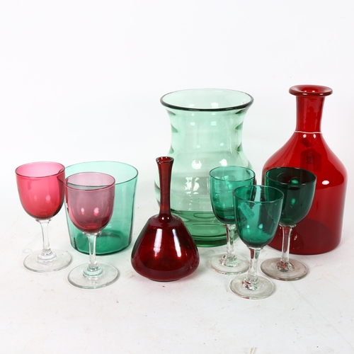 506 - A group of glassware, to include a Whitefriars green glass vase, cranberry glass carafe and 2 Bristo... 