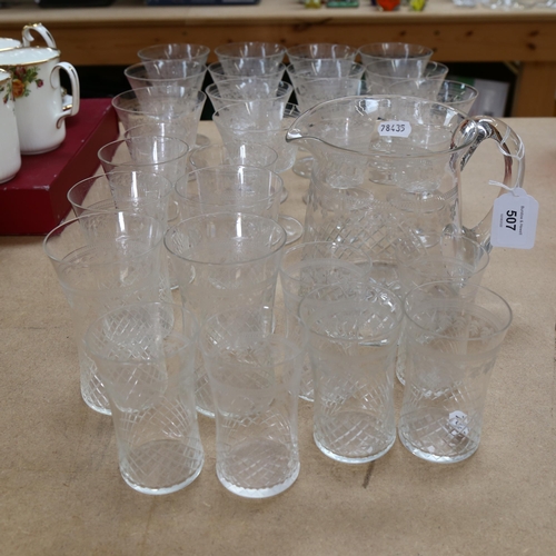 507 - A suite of Vintage etched glassware, including 13 Champagne glasses, tumblers etc, and water jug (29... 