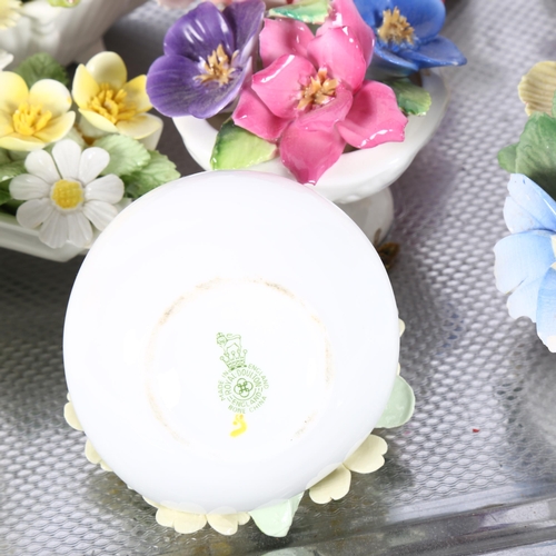 509 - A group of ceramic floral ornaments, including Coalport, Crown Devon and Adderley