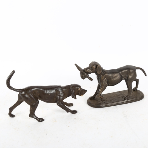 516 - A cast-iron hunting dog with pheasant, and another (2)