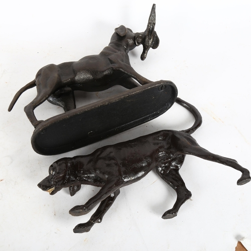 516 - A cast-iron hunting dog with pheasant, and another (2)