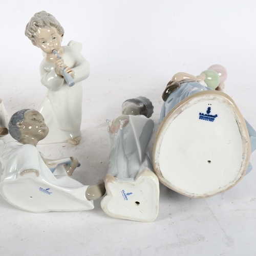 517 - 5 various Lladro figurines, including an angel with a flute, balloon seller etc