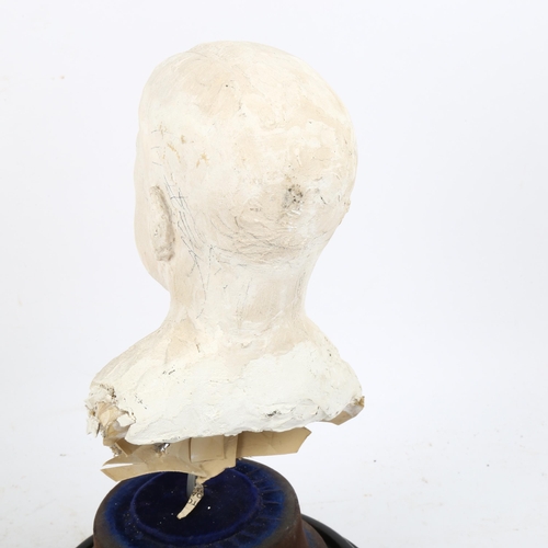 777 - A plaster bust of a man on base, height including base 25cm