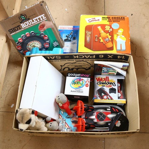 492 - A box of various toys and games, including a Thomas The Tank Engine carry case with various locomoti... 