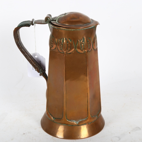 535 - A Keswick School of Industrial Art Art Nouveau copper-lidded jug, with stylised decoration and leath... 