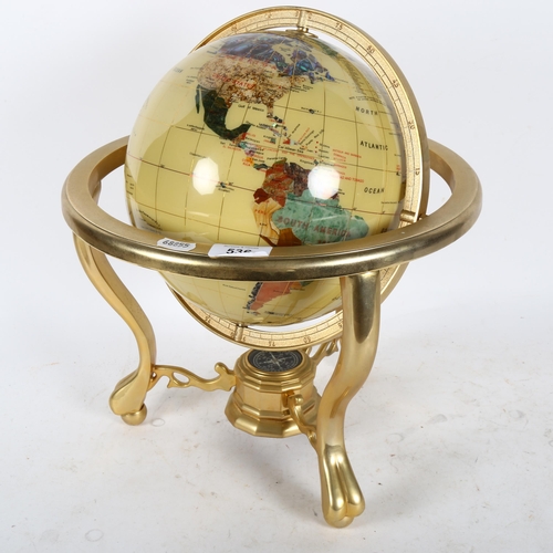 536 - A reproduction terrestrial globe on stand of small size, height 37cm