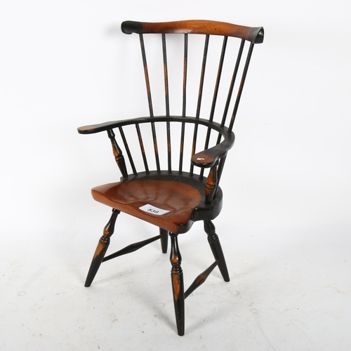 539 - A miniature doll's Windsor elbow chair, height 38cm