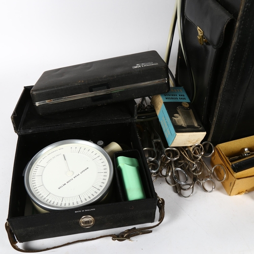 559 - A physician's case and contents, including medical instruments and tools